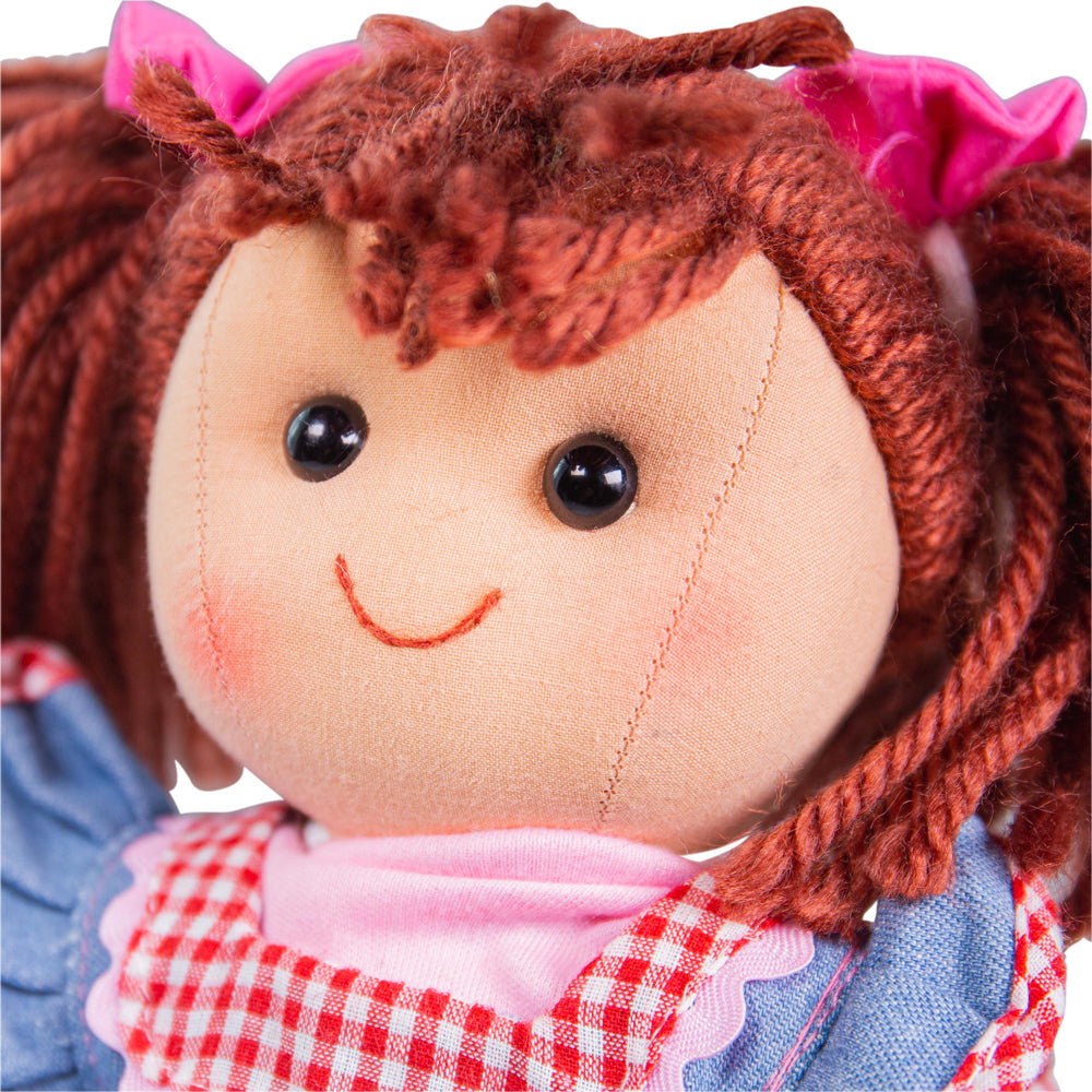 Melody Doll - Medium, Introducing Melody, the perfect companion for any child seeking endless adventure and companionship! This irresistibly soft and cuddly doll will capture hearts with her vibrant and brightly colored hair, adding a touch of whimsy to playtime.Dressed in a delightful and playful smock, Melody boasts a captivating charm that will enchant children of all ages. Her outfit is designed to spark imagination and creativity, encouraging young minds to embark on exciting journeys through imaginati