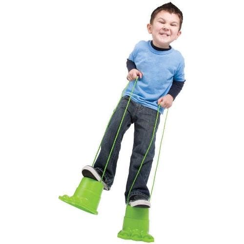 Monster Feet, Get ready to stomp and roar with our pack of two Monster Feet! These roarsome stilts are designed to raise the wearer by 12cm, making them feel like a mighty giant as they march around.Our Monster Feet are not only fun, but they also help children develop coordination and balance. With their unique and colorful design, these stilts are a great way to engage kids in physical activity while having a blast. Made from durable green plastic, these monster feet-shaped stilts are built to withstand h