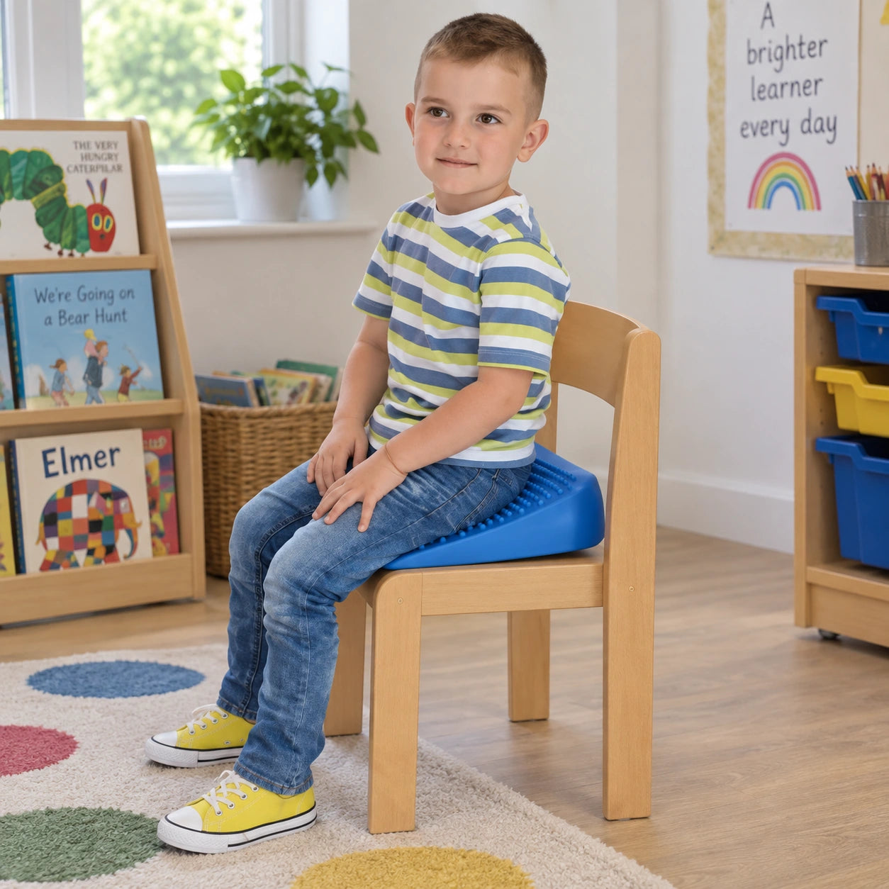 Move and Sit junior blue seat wedge in natural learning setting, view 2