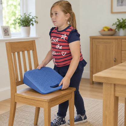Move and Sit junior blue seat wedge in natural learning setting, view 4