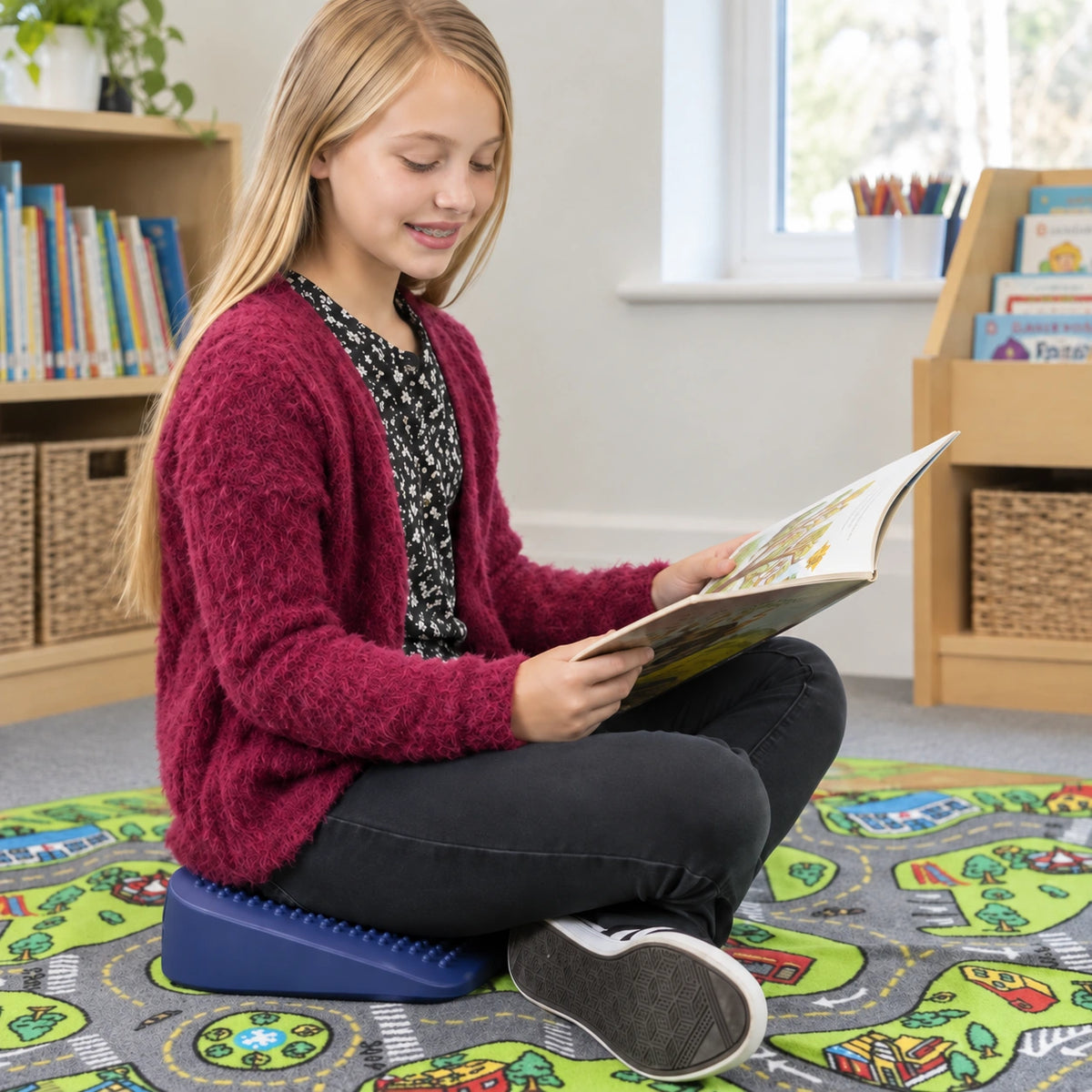 Move and Sit junior blue seat wedge in natural learning setting, view 5