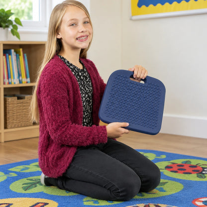 Move and Sit junior blue seat wedge in natural learning setting, view 6