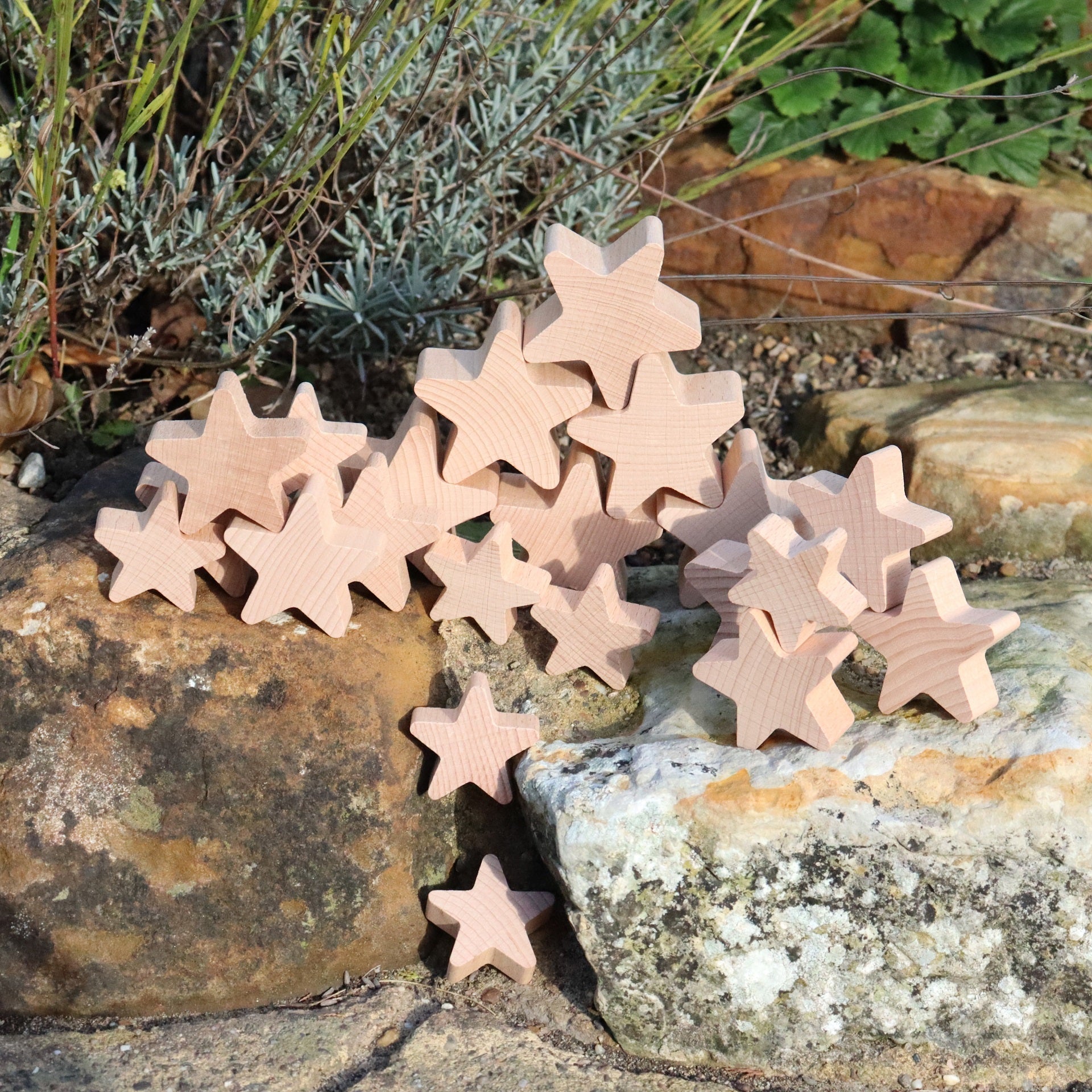 Natural Wooden Stars, Our TickiT® Natural Wooden Stars are made from beautiful smooth solid beechwood with a natural woodgrain finish. An inspiring addition to our heuristic play range. Chunky and tactile, they are easy for small hands to manipulate, stack, count, sequence and explore. These simple and curious natural smooth wooden stars will spark your child's imagination and encourage them to explore ways to incorporate them into imaginative play and learn about the world around them. Quite simply, they s