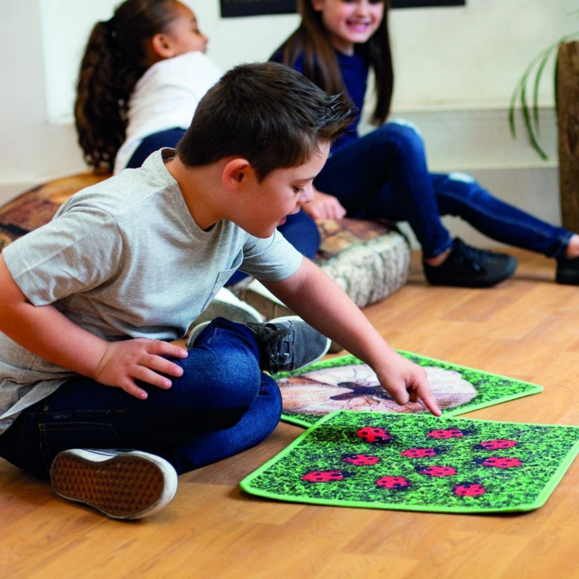 Natural World Counting Indoor Outdoor Mini Placement Carpets With Holdall, Pack of 35 woodland themed carpet tiles that can be used both indoors and out. A great way for children to practice sums and number bonds. The Natural World Counting Indoor Outdoor Mini Placement Carpets With Holdall Pack includes numbers 0-10, corresponding objects for numbers relating to the theme as well as plus, minus and equals signs. Versatile carpet tiles to support multiple maths objectives, from number recognition, counting 