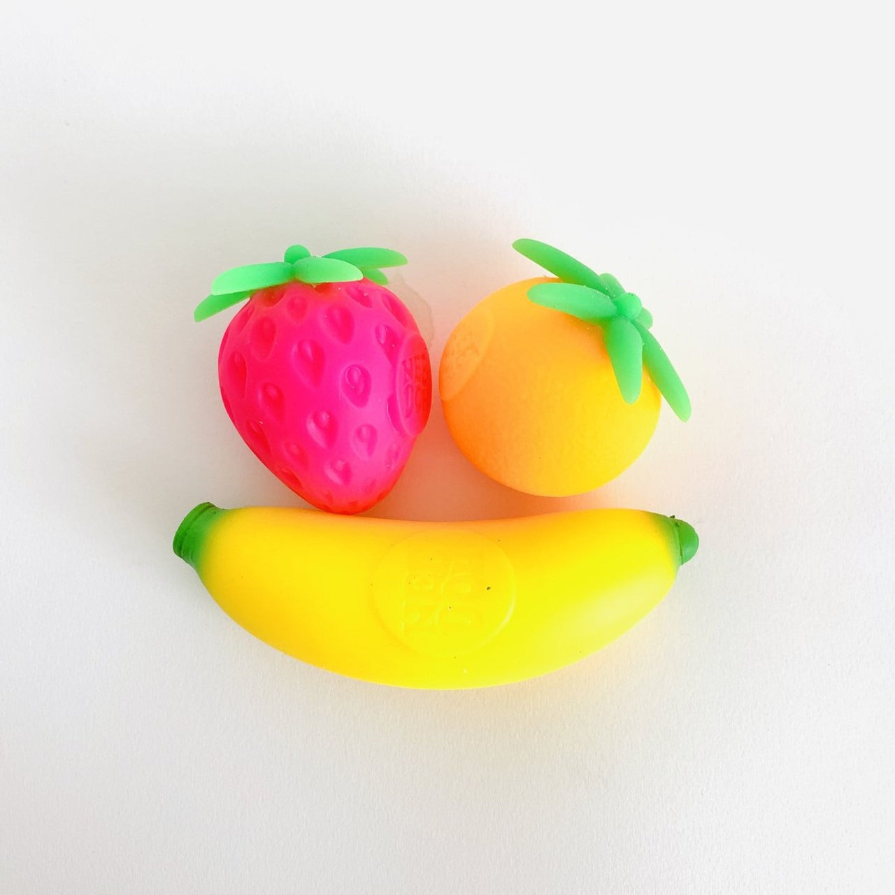 Nee Doh Groovy Fruits, Schylling’s Groovy Fruit Nee Doh is packed with fruity fun. This unique Nee Doh Groovy Fruits fidget toy comes with a Boss Banana, Outta Sight Strawberry, and Far Out Orange that can be squeezed, squished, pulled and popped. Nee Doh Groovy Fruits are made from a non-toxic, dough-like material that always bounces back to its original shape. It can be squished, squashed, pulled and smushed. Ideal for on the go fidget toy fun or as an anxiety reliever. Nee Doh Groovy Fruit also helps chi