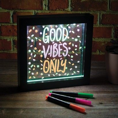 Neon Message Writing Board, Help develop your child's creativity with this wonderful, innovative sensory toy set. The LED drawing board is a fascinating new development in children's entertainment, that will provide your kids with boosted enthusiasm as they attempt to create amazing colourful works of art. Create your own glowing messages on the glass of this light up neon effect frame. The 23cm square frame is made from plastic and features a central glass panel for writing your messages. Use the bright, v