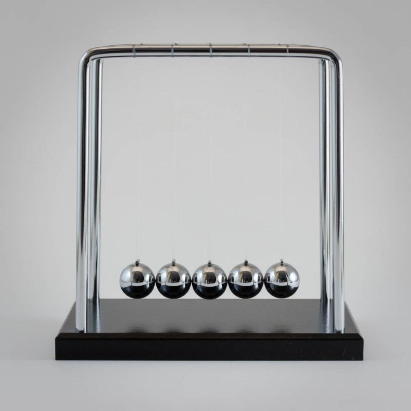 Newtons cradle, A simple and sensibly priced version of the old favourite where, once set in motion, the metal balls demonstrate the 'action-and-reaction' phenomenon as they attempt perpetual motion. A fantastic toy for those children who like repeating motion. Also a fantastic distraction toy When one of the steel balls is lifted and allowed to fall back at one end, one will swing out the same distance at the other end This causes the beginning of 'perpetual motion' which dies down only as a result of fric