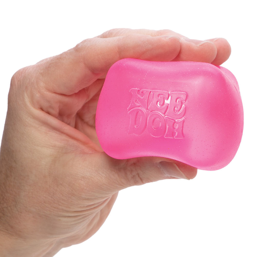 Nice Cube Needoh, Chill out with the coolest fidget toy in town, Schylling’s Nice Cube NeeDoh! This satisfying stress ball comes in three translucent colours, including purple, pink and blue, creating a snazzy ice cube effect. Nice Cube NeeDoh is the ideal size for little hands to hold, squeeze, squish and smush. But don’t worry, the non-toxic, dough-like material will always bounce back to its original shape. Ideal for on the go fidget toy fun or as an anxiety reliever. This Nee Doh Stress Ball will also h