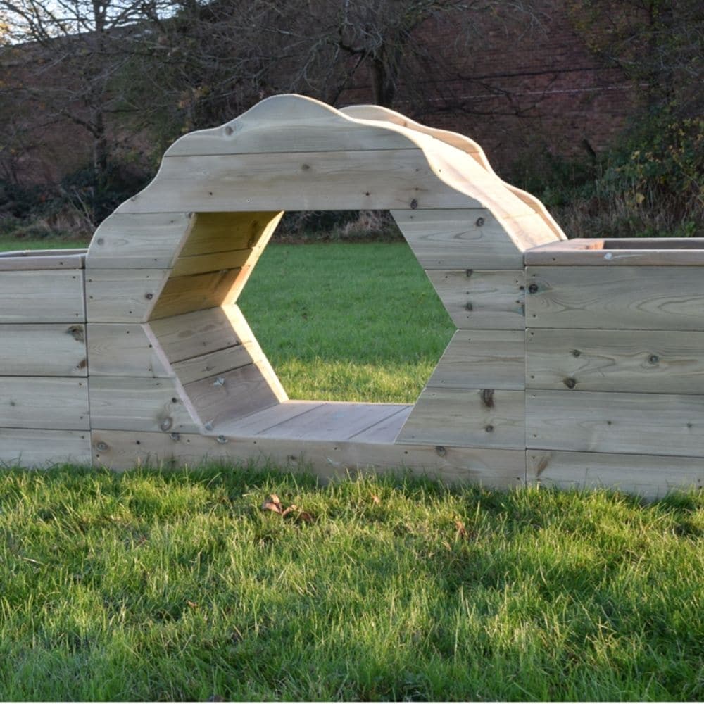 Outdoor Adventure Tunnel, Who's up for going on an adventure! Children will love crawling, climbing, and hiding inside this robust Outdoor Adventure Tunnel resource. Planters are situated at each end of the tunnel, generating a natural feel to any outdoor play setting. Fill the planters with soil and make the tunnel into a centerpiece for your nursery or school play area. FSC Pressure Treated Redwood Timber Partial assembly required 12 month warranty Assembled dimensions (mm): H1040 x W600 x L2400 Age: 3 Ye