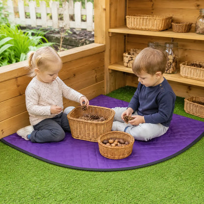 Outdoor Corner Mat natural loose-parts play in a nursery garden