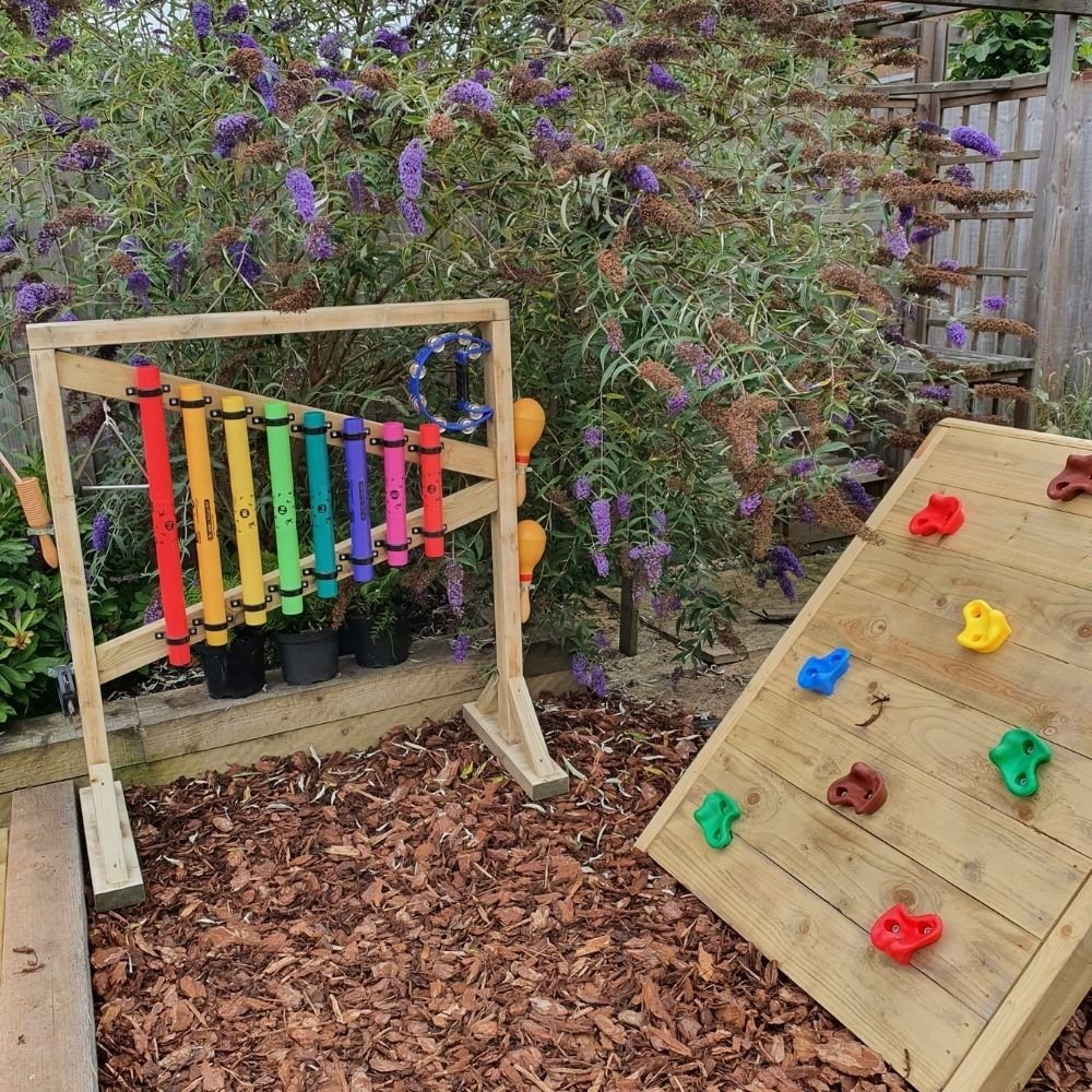 Outdoor Percussion Stand, Soothing musical and colourful chimes bringing music to any garden. A set of eight multicoloured chimes mounted on a robust free-standing timber frame. Our Outdoor percussion stand is all about fun learning. Improving fine and gross motor skills and aids in cognitive development. Great for burning energy and allows your child to familiarise themselves with tones, sounds, textures and colours for a perfect music experience. So Who loves to dance. So, if you're looking for an interac