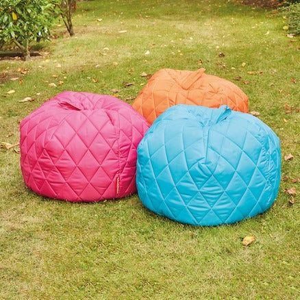 Outdoor Quilted Beanbags 4pk, The Outdoor Quilted Beanbags are designed with children in Key stage 1 & 2 in mind. The Outdoor Quilted Beanbags are sold as a set of 4 beanbags and they are a great flexible comfortable seating. The Outdoor Quilted Beanbags are manufactured from durable wipe clean quilted fabric for that extra level of comfort and stability. They can be used both indoors or outdoors. Set includes : x1 Red, x1 Lime, x1 Orange & x1 Yellow. The quilted outdoor beanbags are designed with children 
