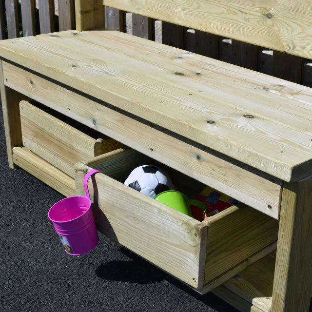 Outdoor Storage Buddy Bench, Introducing the Outdoor Storage Buddy Bench, a versatile and essential addition to any playground. This bench offers a perfect combination of seating comfort and ample storage space for trays, boxes, or crates. Designed with children in mind, it grants them easy access to all their playground essentials conveniently located underneath the bench. The Outdoor Storage Buddy Bench is crafted with durability in mind, this multi-functional resource is built to withstand the test of ti
