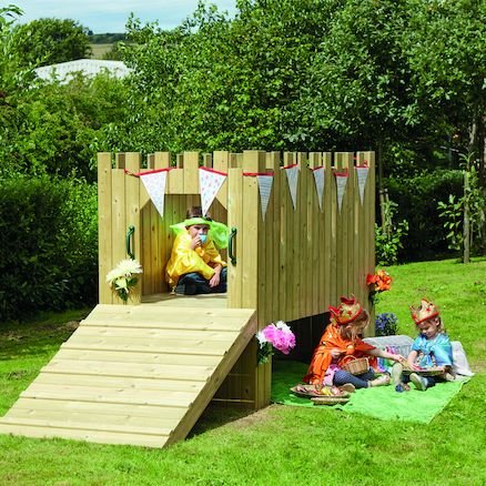Outdoor Wooden Play Castle, Children can crawl under the castle or clamber up the pretend drawbridge whilst building gross motor skills. The Outdoor Wooden Play Castle is an abode fit for kings and queens, a home corner, a reading den or a scene from a fairytale. Watch the children use their imaginations to envision this castle structure as whatever they wish it to be. Accessories not included. Upstairs is an open space with two corner shelves. A robust, quality, open ended design. Made from Scandinavian Re