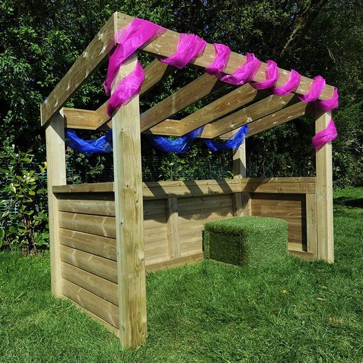 Outdoor Wooden Role Play Centre, This beautifully finished, open ended wooden structure will make a fantastic addition to your outdoor role play area. What will it be today – a home corner, shop, busy garage or simply a cosy den? The open design will lend itself to many different possibilities.The roof is slatted so mobiles and weaving shapes can be hung from it, or peg some fabric on top to make a cosy space. Beautifully finished for a quality appearance. The wood has a 10 year guarantee against rot and in