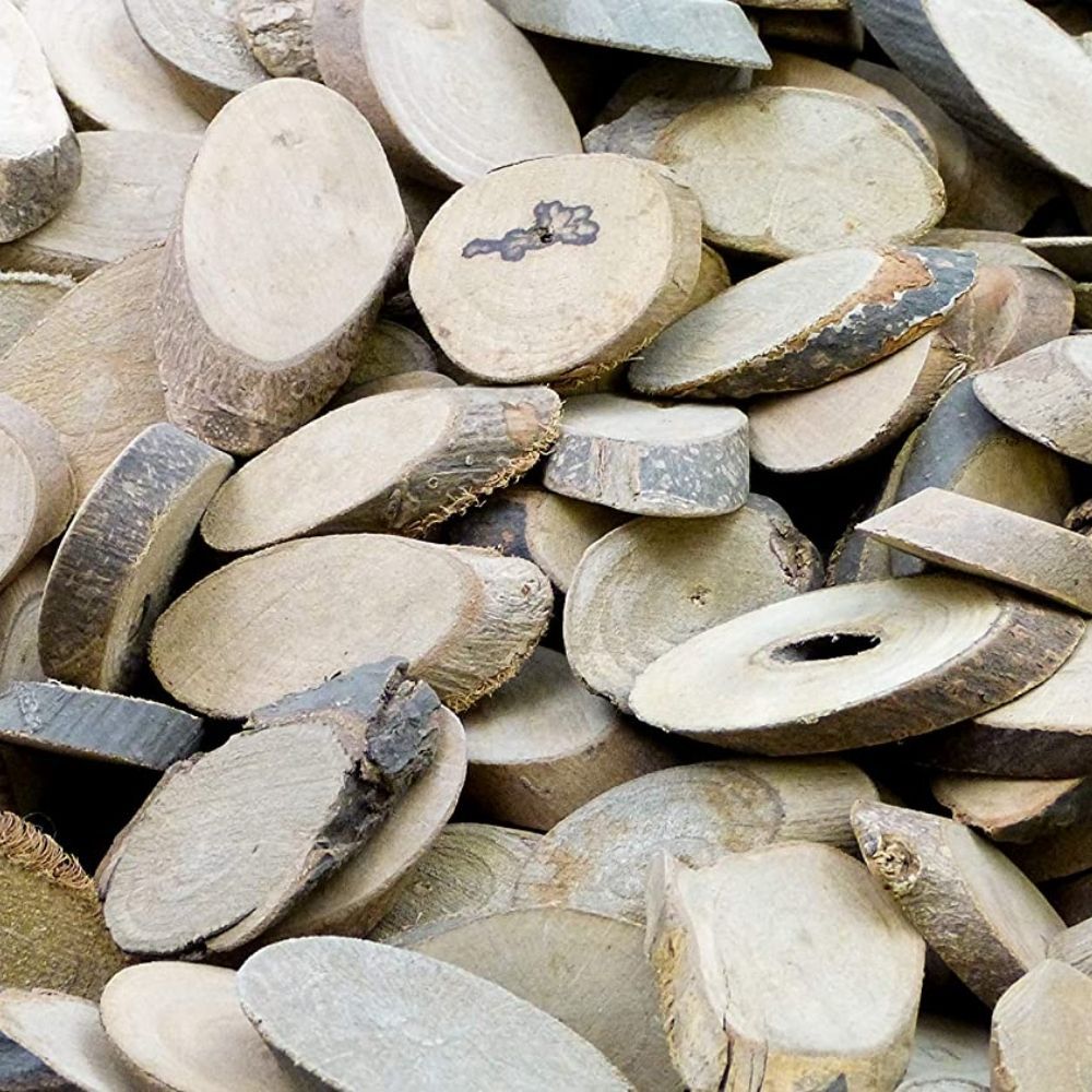 Oval Branch Offcuts Pack of 250g, This Oval Branch Offcuts Pack of 250g includes over 75 pieces of Oval Branch Offcuts in assorted sizes, ideal for sensory exploration. Each of the Oval Branch Offcuts has its own distinguishing characteristics such as markings, holes and crevices featuring a smooth finish with natural markings and grains, this asset can be used on its own or as part of a larger group of sensory resources. The Oval Branch Offcuts Pack of 250g encourage's young learners to inspect them thorou
