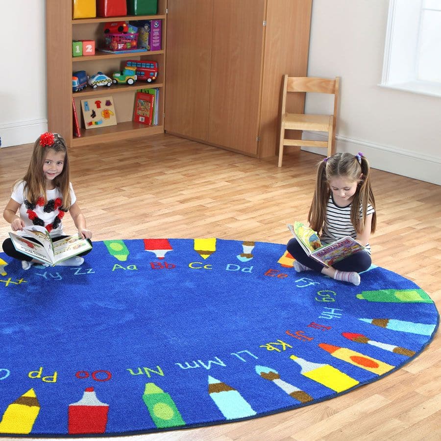 Oval Pencils Alphabet Carpet, This highly visual, Oval Pencils Alphabet Carpet combines learning the letters of the alphabet and colour recognition. An essential when teaching literacy, introducing letter formation and testing children's ability to recognise the difference between capital and lower case letters. The Oval Pencils Alphabet Carpet is finished with an extra thick pile designed specifically for comfort and longevity. Rainbow oval 3x2m carpet depicts pencils and the alphabet. Decorative carpet th
