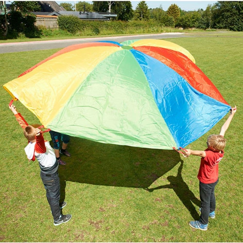 Parachute Games 3.5 metre, Parachute play is a novel and fun way of encouraging new skills and development. This 3.5 Metre Parachute is colourful and sometimes calming, it can create soft, whispering sounds, or loud rippling noises, depending on how quickly it is moved. Working together encourages co-operation, trust, communication and social skills. Also encourages movement of muscles in the upper body. Games can involve touching the soft parachute fabric, moving or lying beneath or over it, and watching i