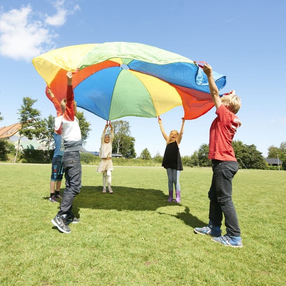 Parachute Games 3.5 metre, Parachute play is a novel and fun way of encouraging new skills and development. This 3.5 Metre Parachute is colourful and sometimes calming, it can create soft, whispering sounds, or loud rippling noises, depending on how quickly it is moved. Working together encourages co-operation, trust, communication and social skills. Also encourages movement of muscles in the upper body. Games can involve touching the soft parachute fabric, moving or lying beneath or over it, and watching i
