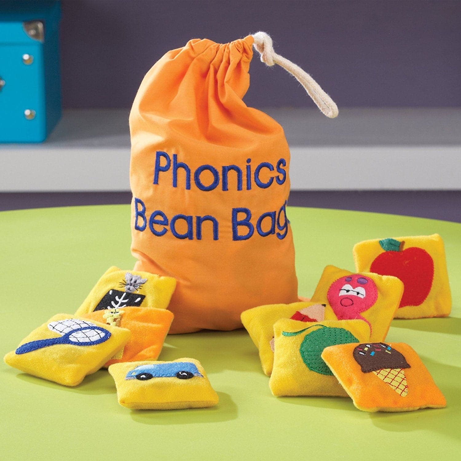 Phonics Bean Bags, These colourful 9cm embroidered Phonics bean bags are a great tactile way to reinforce letters and sounds. Each Phonic bean bag features an appealing picture representing the letter, with special double-sided bean bags for short and long vowel sounds, and the hard and soft sounds of c and g. The Phonic bean bag set Includes cloth storage bag and Activity Guide. Encourage phonic sound recall Each bean bag features a picture that represents a sound 26 embroidered bean bags Includes Activity