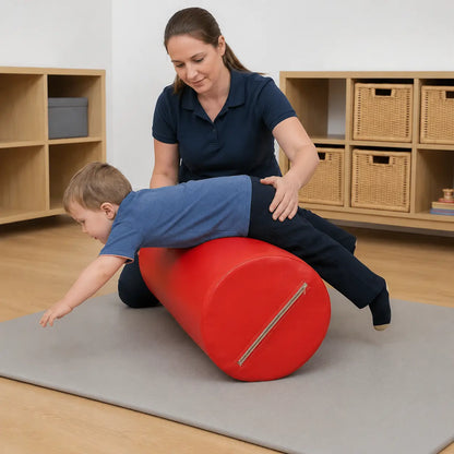 Physio Roll supervised rocking in a naturally lit early years nursery