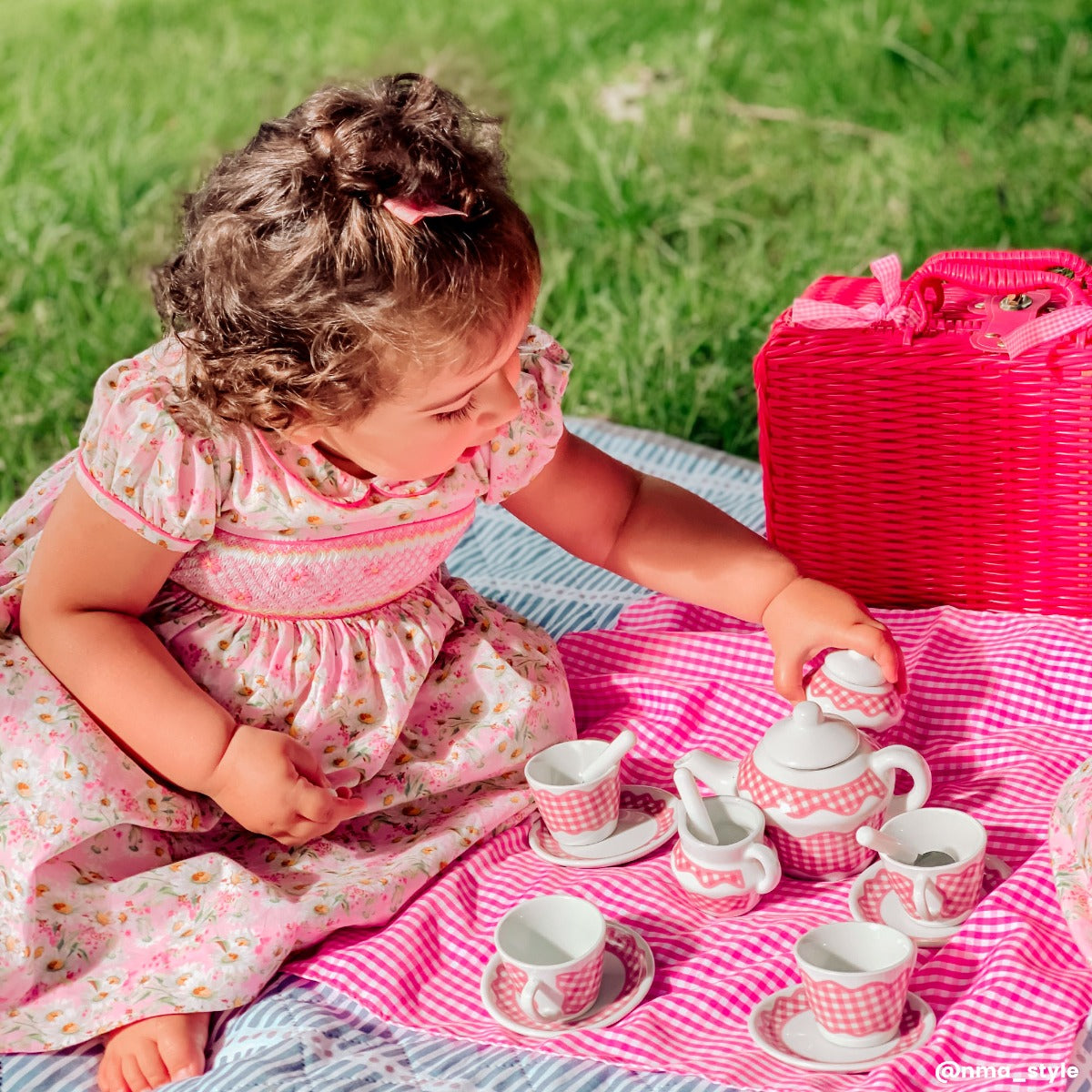 Picnic Tea Set, Host a luxurious tea party for your teddies and dolls with this delightful Tidlo Picnic Set. A traditional kids tea set, it features four porcelain plates, cups and spoons, a milk jug, teapot, a sugar pot, napkins and a small blanket. This brilliantly bright childrens tea set comes complete with a wicker-effect hamper that features a carry handle and lockable strap. It can be taken to the beach, park, garden and even abroad. The ideal travel companion. Toy tea sets are a great way to encoura