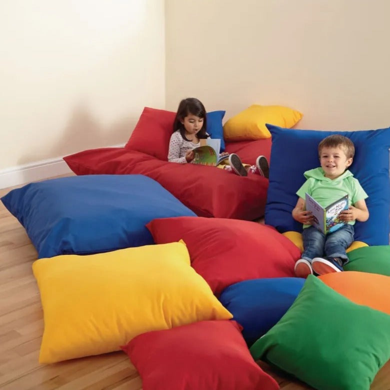 Plain Cushion Large Pack of 4, The large cushions come as a pack of 4, 1 of each of blue, red, green and yellow. The bright and vibrant colours make these the perfect addition to any sensory room,classroom or Early years setting. Children will be drawn to the bold colours and enjoy sitting in comfort on the Plain Cushion Large Pack of 4. Each cushion filling is flame retardant to BS5852 ignition sources 0 and 1 and all are machine washable at 30ºC and can be cool tumble dried. Large Size: 1000mm². Machine w