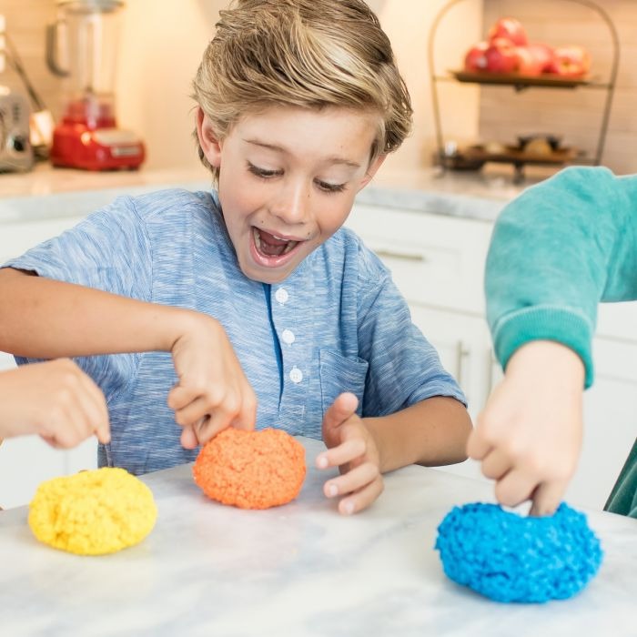 Playfoam Pluffle - 9 pack, Playfoam Pluffle™ is the feelgood fluffy stuff that’s perfect for tactile, sensory play. Tip it out, grab a handful and give it a squish, and then watch its mesmerising, lava-like flowing action. As children squeeze, sift, scoop, grab, and more, they build fine motor skills through sensory play. Award-winning and child-safe, Playfoam Pluffle never dries out, so it’s the perfect creative play toy for activities such as sensory bins. Ideal for use in the classroom or at home. Squish