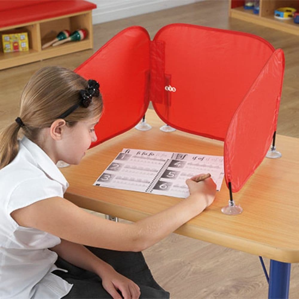 Pop Up Concentration Desk Barrier, The Pop Up Concentration Desk Barrier is an Ideal solution for children who are easily distracted. The Pop Up Concentration Desk Barrier provides a designated space to concentrate on their work. The Pop Up Concentration Desk Barrier can also be placed between pupils to play barrier games or encourage independent learning. Lightweight and easily folded and stored in the bag provided. The barrier needs to be used on a flat, unvarnished surface and suction pads work best when