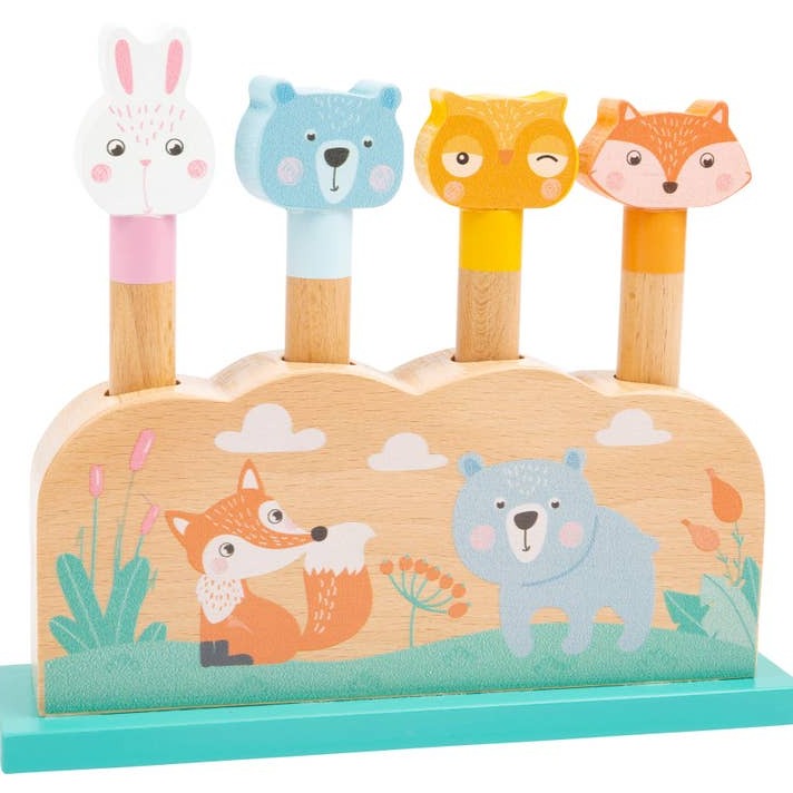 Pop Up Forest animals, Who's jumping around there? This cute wooden shape-fitting game comes in trendy pastel colours. The adorable forest animals made of robust wood are to be inserted into the openings. Since the holes are equipped with springs, the little animals "jump" quickly back out. An exciting wooden toy that trains motor skills and brings playtime fun into the nursery. 🌳 Whimsical Design: Our Pop Up Forest Animals toy is delightfully crafted with trendy pastel hues, ensuring that it's not just fun