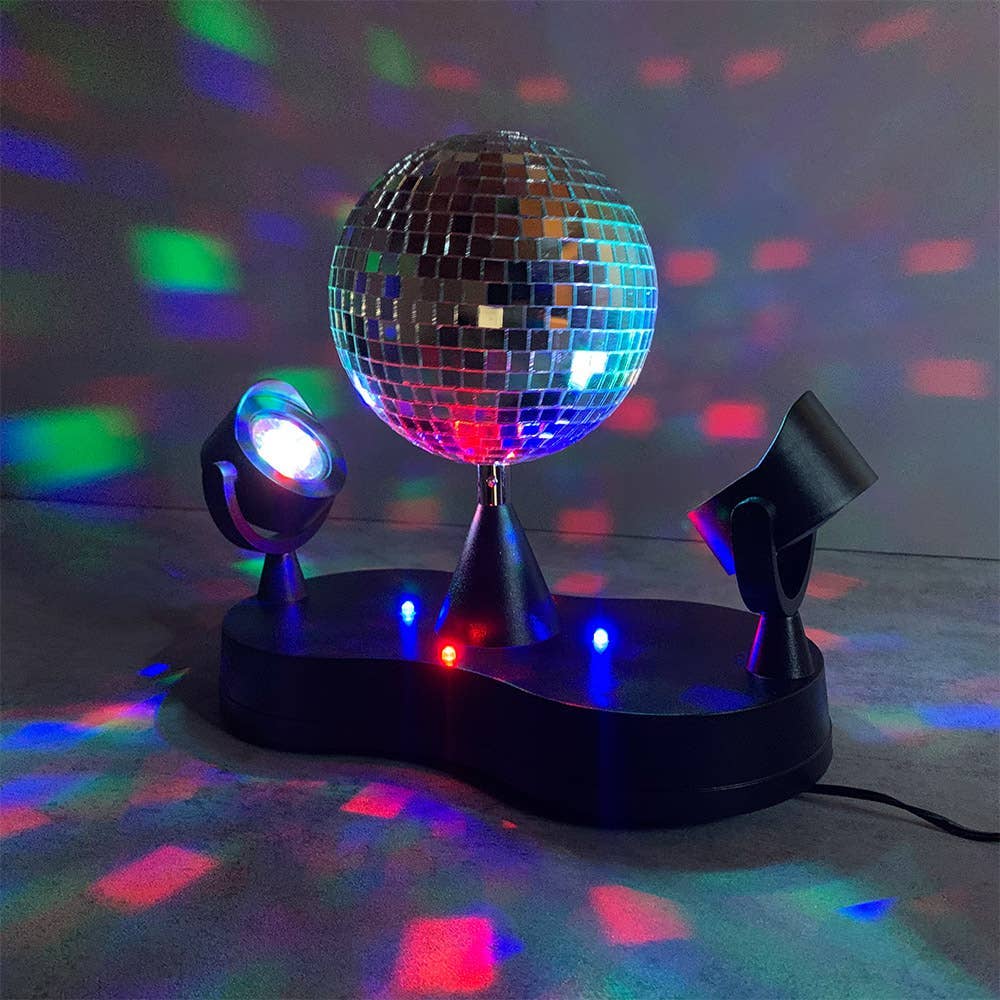 Portable Disco Ball, This portable disco ball has two multicoloured spotlights that you can aim at the ball, filling your room with more vibrance than a ‘70s disco. And, with the lights able to swivel up to 120 degrees, you can perfectly plan the lighting setup letting it strategically highlight the place where you want to light up It’s a mirror peak duo disco ball! Has 120 degree light spectrum Includes a USB power cable A great addition to any bedroom,sensory room or party Ball measures approx. 13 cm (in 