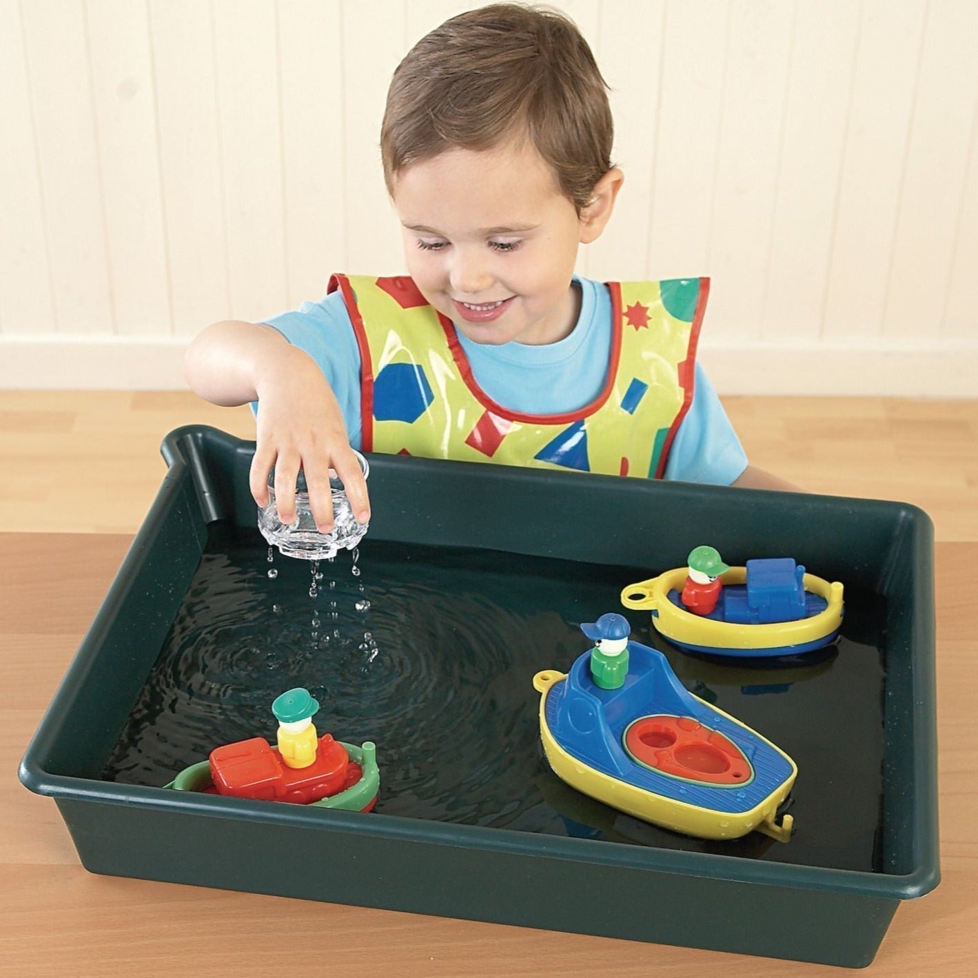 Pouring Tray, The Pouring Tray is a durable plastic tray that can be used inside or outside, on the floor or on a table top. The Pouring Tray is lightweight and the perfect size for children to easily move from one location to another. It is a versatile resource that is especially useful when using liquids due to its corner spout. The Pouring Tray can be used for: Sand and water play Gardening activities Scientific experiments Messy play Size: W400 x L530mm x Depth 95mm., Pouring Tray,Water play tray,water 