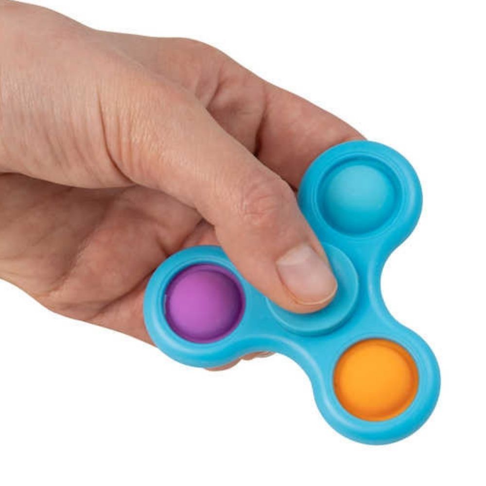 Push Poppers Fidget Spinner, The Push Poppers Fidget Spinner is a delightful fusion of two popular fidget toys, offering a unique way to keep your hands busy and your mind focused. This Push Poppers Fidget Spinner toy aims to provide endless moments of tactile and auditory satisfaction. Push Poppers Fidget Spinner Features: Dual Functionality This Push Poppers Fidget Spinner toy combines the smooth spinning action of a fidget spinner with the pop-and-snap satisfaction of push poppers. Spin it, pop it, or do