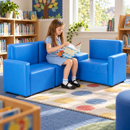 Blue PVC Reading Corner Sofas with child reading in a primary school library