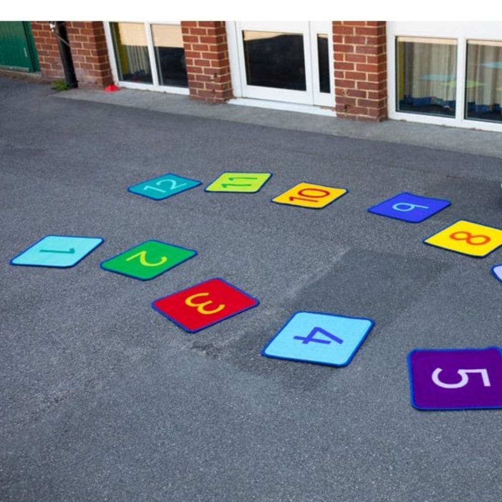 Rainbow 1-24 Numbers Mini Mat Squares & Holdall, Brightly coloured 1 to 24 number mini mats,great for basic group numeracy skills. The Rainbow 1-24 Numbers Mini Mat Squares & Holdall set features distinctive and brightly coloured, child friendly designs designed to encourage learning through interaction and play. Crease resistant with unique outdoor Rhombus™ anti-skid Dura-Latex™ safety backing. Abrasion resistant, laboratory rub tested to heavy duty standards. Tightly bound edges to prevent fraying. Meets 