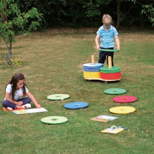 Rainbow Circular Mats & Donut Trolley, The Rainbow Circular Mats & Donut Trolley Set consists of 32 circular cushions which are ideal for group work. The Rainbow Circular Mats fit neatly onto the wooden trolley supplied to store away the Rainbow Circular cushion's when not in use. Brightly coloured soft circular mats suitable for indoor and outdoor use with handy storage trolley. Set of 32 versatile mats which are suitable for indoor and outdoor use. Mats are washable at 30°C to help maintain an hygienic cl