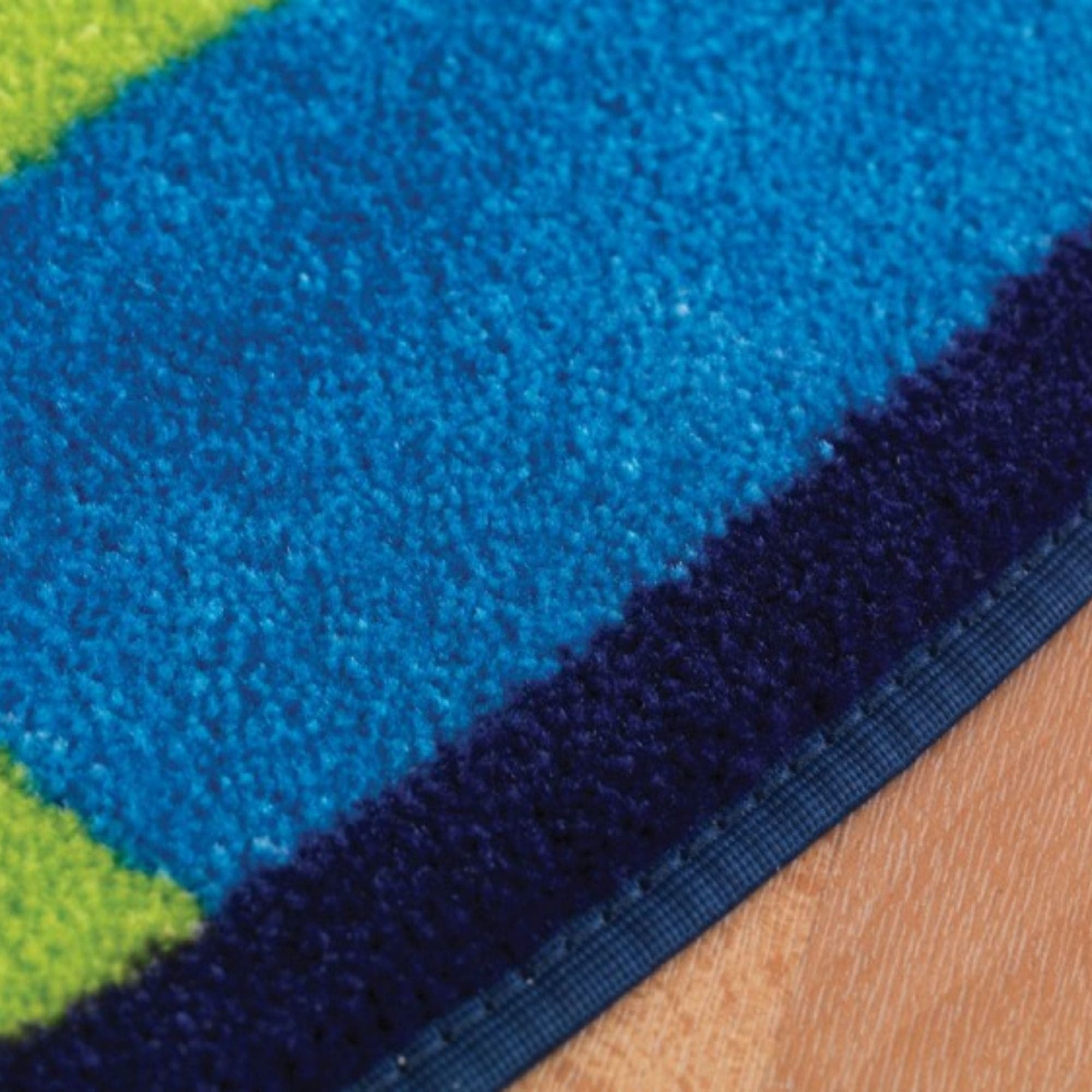 Rainbow Colour Palette Carpet, This vibrant Decorative Rainbow Colour Palette Carpet will brighten up any indoor classroom space. The Rainbow Colour Palette Carpet will develop children's knowledge of primary and secondary colours. The Rainbow Colour Palette Carpet is Ideal for rest and reading activities. Also a great and functional carpet to brighten up any classroom. The Rainbow Colour Palette Carpet is a functional carpet made with heavy duty tuf-pile, with anti slip backing to ensure safety on differen