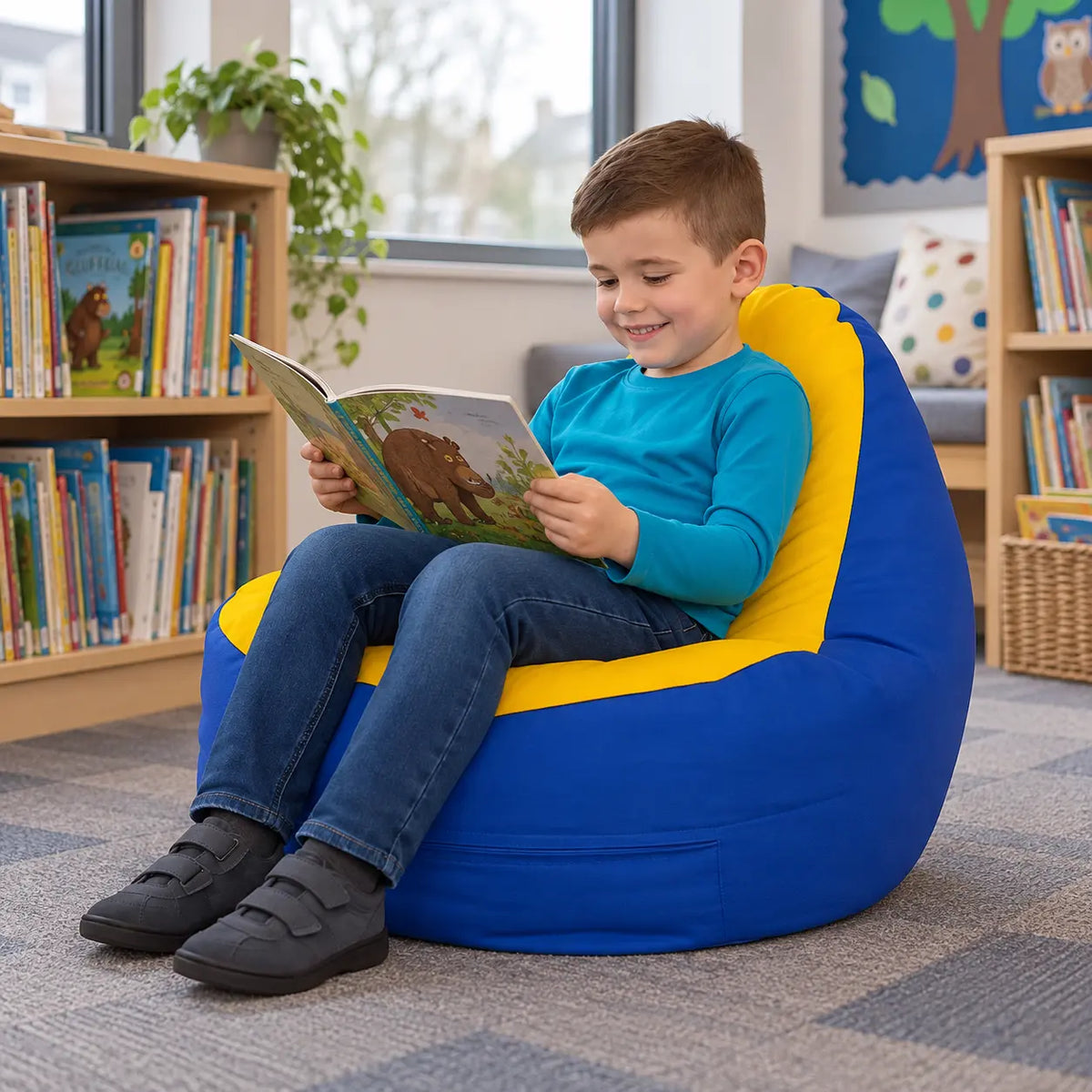 Rainbow Easy Clean Bean Bag Chair with child reading in a school library