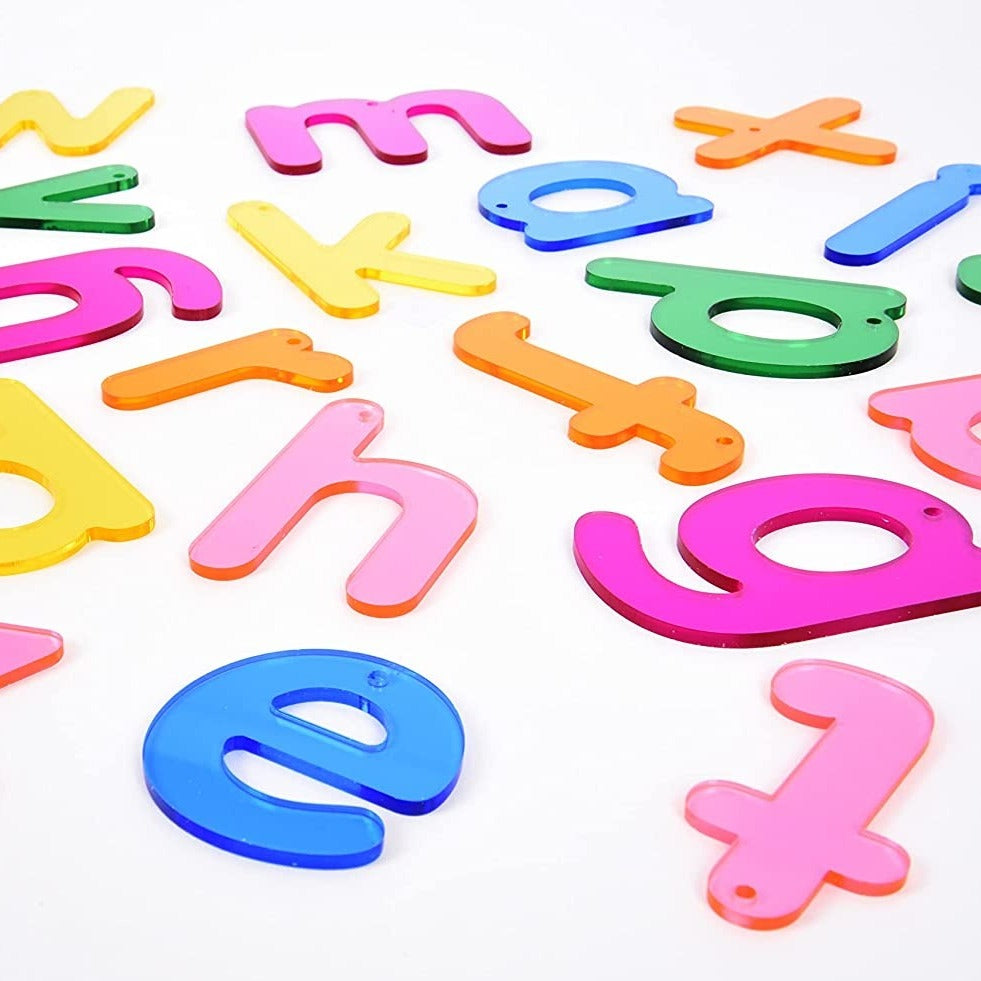 Rainbow Letters Pack of 26, TickiT® Rainbow Letters are colourful clear acrylic letters in a clear child-friendly font, making them ideal for letter recognition and learning the alphabet. Their tactile and colourful properties capture your child's attention, encouraging them to trace the shape of the letters with their finger on the smooth surface.The Rainbow Letters are ideal for use with a light panel. Each Rainbow Letter has a hole at the top to allow you to create hanging letter displays or mobiles.Rain