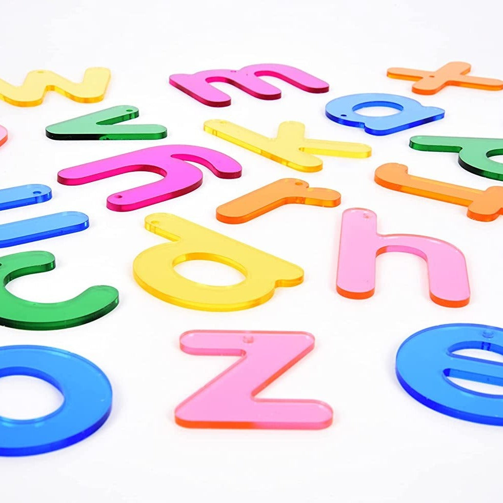 Rainbow Letters Pack of 26, TickiT® Rainbow Letters are colourful clear acrylic letters in a clear child-friendly font, making them ideal for letter recognition and learning the alphabet. Their tactile and colourful properties capture your child's attention, encouraging them to trace the shape of the letters with their finger on the smooth surface.The Rainbow Letters are ideal for use with a light panel. Each Rainbow Letter has a hole at the top to allow you to create hanging letter displays or mobiles.Rain