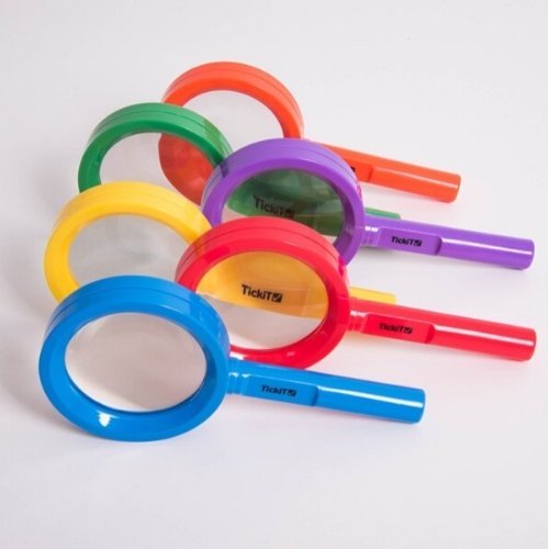 Rainbow Magnifiers Pack of 6, TickiT® Rainbow Magnifiers are the perfect size for small hands. The brightly coloured hand magnifiers are an ideal way for your child to examine and investigate items from their natural environment, such as leaves, soil, natural patterns and insects.The lens enables up to 3x magnification for close up inspection.Rainbow Magnifiers Set includes: 6 magnifiers in 6 colours (red, blue, yellow, orange, green, purple).Size: L 16cm x 8cm diameter.Age: Not suitable for children under 