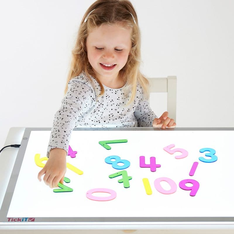 Rainbow Numbers - Pk14, TickiT® Rainbow Numbers are colourful clear acrylic numbers in a clear child-friendly font, making them ideal for number recognition and counting activities. Their tactile and colourful properties capture your child's attention, encouraging them to trace the shape of the numbers with their finger on the smooth surface. Ideal for use with a light panel. Each number has a hole at the top to allow you to create hanging number displays or mobiles.Set includes: 14 acrylic numbers 0-9 in 5