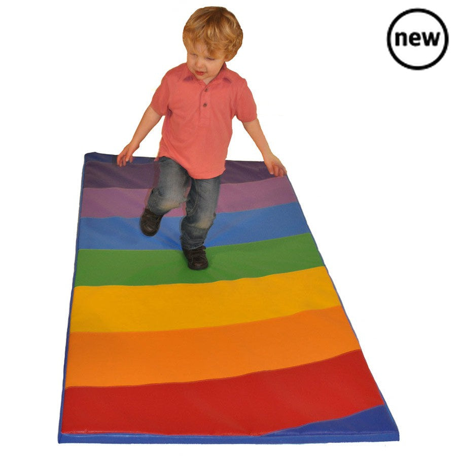 Rainbow Play Mat, Discover the vibrant world of the Rainbow Play Mat, where safety meets education in a riot of colors and an ocean of fun! Expertly designed to offer a reliable safety surface for energetic play activities, this play mat is a must-have in every child's play area. Let's delve deeper into the features that make this play mat the perfect choice for your child: Dimensionally Generous Measuring a spacious 180cm x 90cm x 3.5cm, this play mat offers ample space for children to play, explore, and l