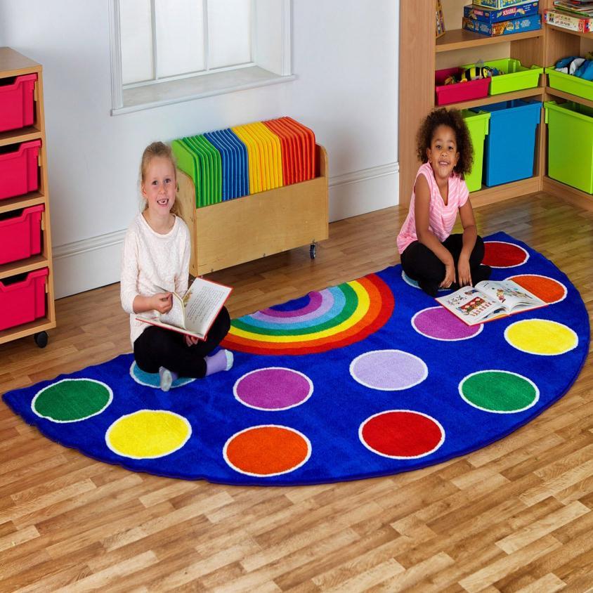 Rainbow Semi Circle Classroom Carpet, This highly colourful Rainbow™ Semi-Circle Placement Carpet features 13 placement spots and 1 teacher spot making it the perfect addition to any reading area or simply as a bright new colourful addition to any classroom. This highly colourful semi-circle placement carpet features 13 placement spots and 1 teacher spot. Great for reading areas or just a bright addition to the classroom environment. Carpet features: Distinctive and brightly coloured, child friendly designs