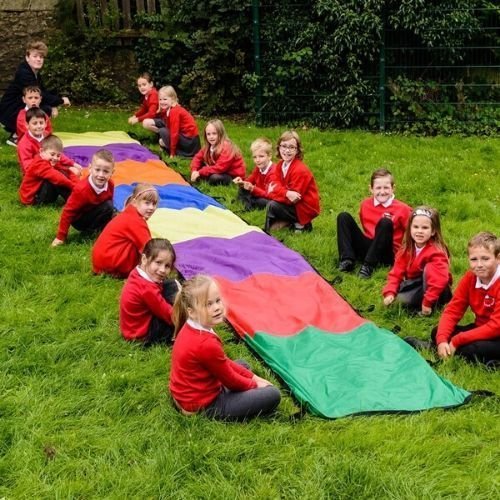 Rainbow Wave Parachute, This brightly coloured rainbow wave parachute is ideal for group participation for up to 30 children of all ages and abilities. Use the Rainbow Wave Parachute for developing social and team work skills, colour identification, estimation and probability. The Rainbow Wave play parachute encourages physical exercise for the whole body and is a highly effective way of developing co-ordination and balance. Children can use their imagination to create a variety of different games, for exam