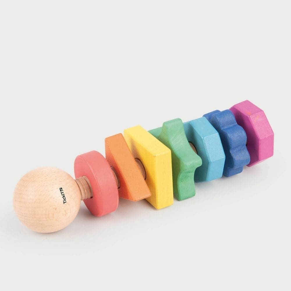 Rainbow Wooden Shape Twister, Our TickiT® Rainbow Wooden Shape Twister is made from beautiful smooth solid beechwood with a natural woodgrain finish in the seven different colours of the rainbow. A giant bolt with seven nuts in different shapes and each shape has a varying number of edges, increasing from 1 (a circle) to 8 (an octagon). The Rainbow Wooden Shape Twister has chunky wooden pieces which are tactile and perfect for your child to hold and manipulate easily. Ideal for learning colours and shapes a