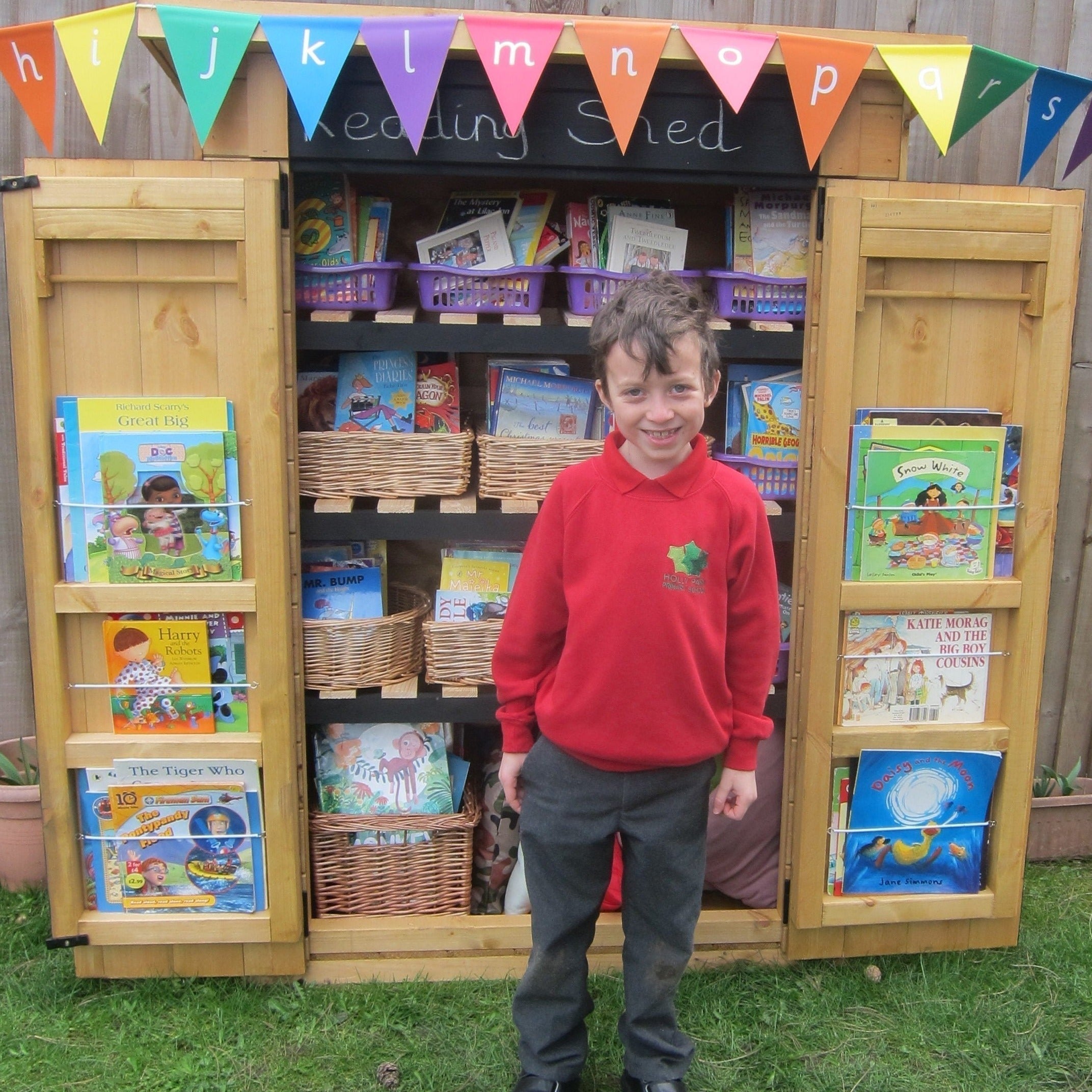 Reading Shed, This Reading Shed will store a wide range of resources to create an exciting and engaging outdoor learning environment. This Reading Shed can be configured with shelves spaced for books or baskets of books, storage space for cushions and beanbags and the capacity to store story props and phonics resources.The Reading Shed also allows you to hang bunting and washing lines for sequencing stories as well as blackboard painted doors for storytelling. The Reading Shed can be decorated to the imagin