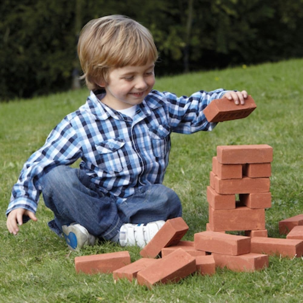Real Mini Bricks, Get busy building with these Real Mini Bricks, made from real clay and ideal for construction sites, counting and much more. With all the same properties as house bricks, children will love ‘cementing’ the Real Mini Bricks together with wet play sand.Children can create imaginary structures for hours whilst gaining an understanding of weights and measures, textures and problem-solving.Use play sand as cement, along with our wooden construction tools to build mini walls. As with house brick