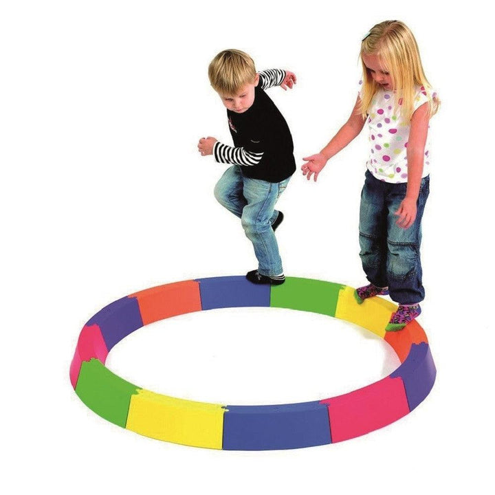 Round Balance Path, Introduce your children to a world of balance and coordination with the Round Balance Beam, a vibrant and versatile set of 12 detachable walkway pieces. These pieces can be assembled into a colourful, circular balance path, providing children with a delightful and engaging way to hone their balance and coordination skills. Features of the Round Balance Path: Versatile Construction: 12 brightly coloured, detachable pieces that can be assembled into a circular balance path. Durable and Saf