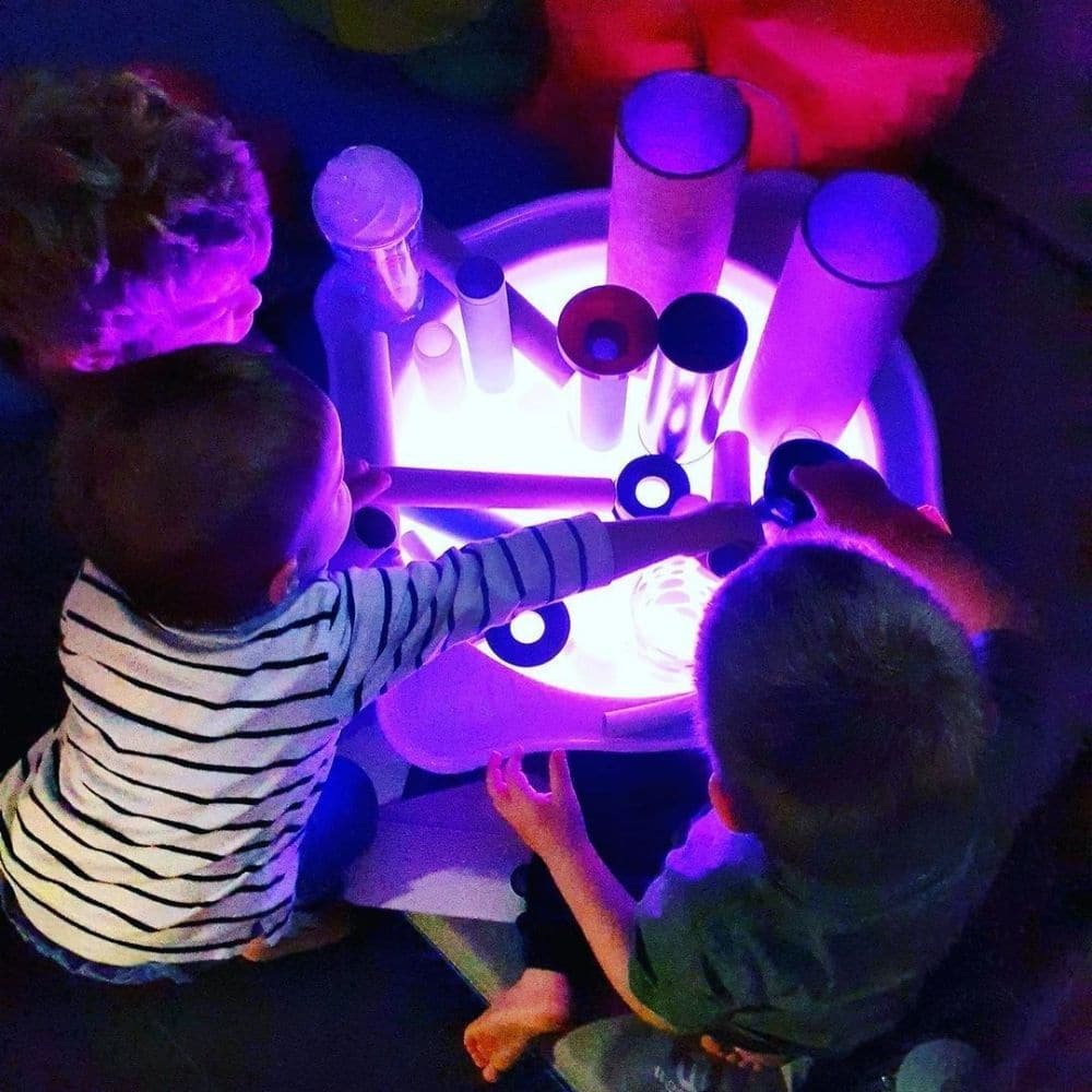 Round Magic Light Table With Tray, This Round Magic Light Table is great for use in play, educational settings and therapy. This Round Magic Light Table will capture children's’ imagination and creativity and is ideal for use in education facilities and therapy centres. The Round Magic Light Table is very compact and light, meaning it can be easily moved. This is a fantastic sensory resource. Create prints, pictures or patterns using a variety of media on the wipe clean table surface. Watch as the illuminat